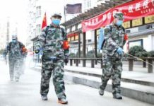 Medical Disaster : Could the Coronavirus Have Leaked From a Chinese Lab? Retired soldiers disinfect a community in Huaibei, China, on 7 February 2020.