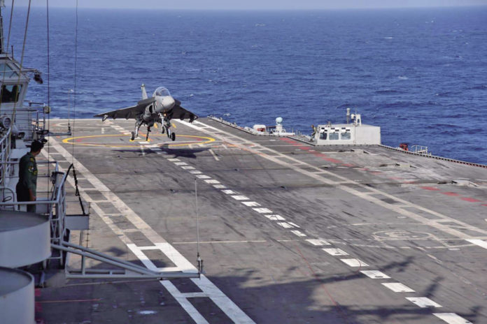 NP-2 a prototype of the naval variant of the Tejas light combat aircraft touching down for an _arrested landing_ on the deck of INS Vikramaditya, on 11 January 2020