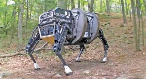 The four-legged Robot Mule easily negotiates rocks and divots in the road and field