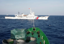 India, US Worried Over Beijing’s South China Sea Push Amid Pandemic A Chinese Coast Guard ship is seen near a Vietnam Marine Guard ship in the South China Sea.