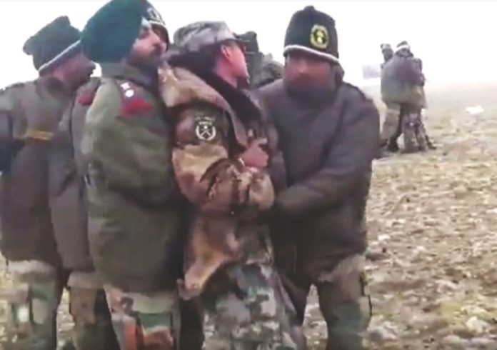 A video grap from YouTube shows Indian soldiers evicting Chinese soldiers from the Doklam plateau