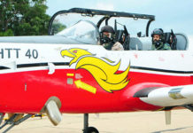 Defence Industry News June 2020 IAF chief Air Chief Mshl RKS Bhadauria in the cockpit of HTT-40 ahead of a sortie at a HAL facility.