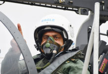 IAF Inducts Second Tejas Squadron IAF chief Air Chief Marshal RKS Bhadauria in the cockpit of a Tejas LCA Mk1A
