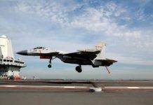 J-15 fighters make debut flights from Chinese second aircraft carrier J15 fighter carrying out an arrestor landing on CNS Shandong