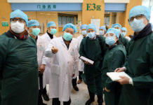 WHO says first alerted to virus by its office, not China Experts from China and the World Health Organization (WHO) joint team at Wuhan Tongji Hospital in Wuhan