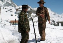 India, China hold border talks to clear LAC perceptions at Depsang An Indian and Chinese soldier at Nathu La pass (file photo)