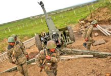 Armenia and Azerbaijan: The Conflict Over Nagorno-Karabakh Nagorno-Karabakh militiamen prepare to fire a howitzer amid the heaviest fighting in the region in decades
