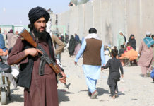 Taliban’s External and Internal Challenges Taliban stand guard as people move forward to cross into Pakistan at the Pakistan-Afghanistan border in Spin Boldak, Afghanistan, 3 Nov 2021