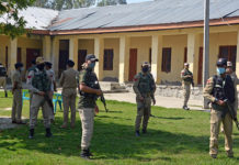 Targeted Killings in the Valley Security personnel at Government Boys Higher Secondary School in Srinagar after militants shot dead two teachers on 7 October 2021.