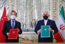 Iran–China 25-year Cooperation Programme Wang Yi and Mohammad Javad Zarif at the Ministry of Foreign Affairs of Iran, after signing the 25-year cooperation deal between China and Iran, 27 March 2021
