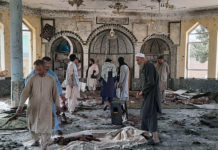 Rivalry Between Taliban and Islamic State to the Fore People view the damage inside of a mosque following a bombing in Kunduz, province northern Afghanistan, Friday, Oct. 8, 2021