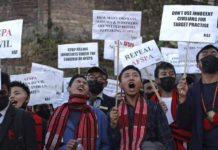 Panel Constituted To Decide On Withdrawing AFSPA From Nagaland People protesting agianst the Armed Forces (Special Powers) Act in Nagaland
