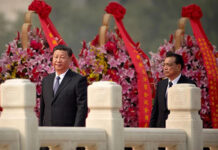 Xi tightens grip on power Chinese President Xi Jinping, left, and Chinese Premier Li Keqiang at a ceremony marking Martyrs' Day at Tiananmen Square in Beijing