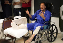 Attack on Imran Khan Plunges Pakistan in Chaos Imran Khan at the Shaukat Khanum hospital, where is being treated for a gunshot wound in Lahore, Pakistan, Nov. 4.