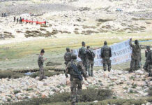 India, China Disengage Troops From PP15 Indian and Chinese troops show banners to each other's patrols on the Line of Actual Control