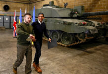 Russia Warns UK Against Sending Fighter Jets to Ukraine British Prime Minister Rishi Sunak, right, and Ukrainian President Volodymyr Zelenskyy at a military facility in England