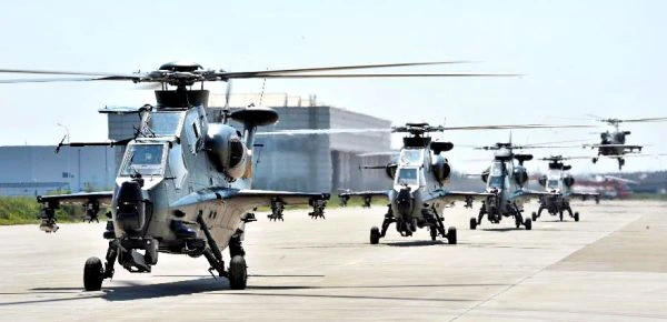 Chinese Helicopter Gunships practise taking-off for the coming China Helicopter Exposition, Sep 2015