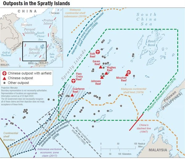 Chinese naval troops and amphibious armor advance ashore during an amphibious exercise