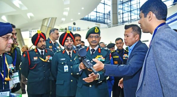 Lt Gen MV Suchindra Kumar, Dy Chief of Army Staff (Strategy) at an exhibition stand