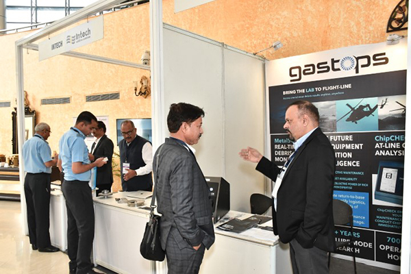 Visitors at the exhibition stand of Gastops