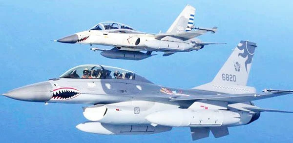 Taiwanese F-16 ﬁghter jets are scambled against Chinese Sukhoi-30 ﬁghter jet over the Taiwan Strait