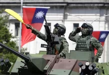 Taiwan’s Ability to Defend the Mainland Taiwanese soldiers salute during National Day celebrations in front of the Presidential Building in Taipei, Taiwan, on Oct. 10, 2021