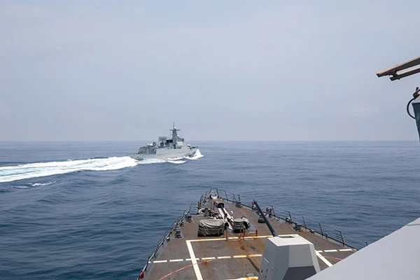 US destroyer USS Chung-Hoon observes the Chinese navy destroyer Luyang III executing unsafe maneuvers in the Taiwan Strait, June 3, 2023.