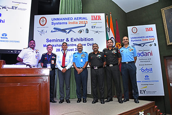 Panelists of Session 2 (from left) Cdr Hemant Shekhar, Cdr (AW)-RPA, Naval HQ, Brig Manish Pande, Brig Ops, Arty Dte, Lt Gen Sunil Srivastava, Director CENJOWS, Air Vice Mshl George Thomas, ACAS (Plans), Air HQ, Col NR Choudhury, Col Inf-5, Infantry Dte, Army HQ, Col Jasbir Singh Maan, Col Avn-10 (RPAs), Army Avn Dte, and Gp Capt NK Chaubey, Gp Capt Ops (NBC & RPAs), Ops AD Dte, Air HQ.