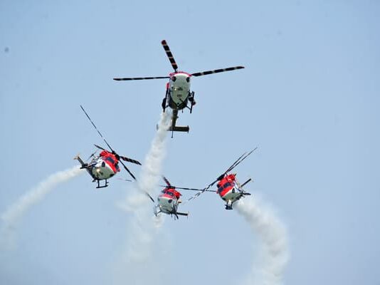AIR SHOW – Fighter Jets Soared in Bhopal Skies Sarang Helicopter Display Team of the IAF during the Bhopal Air Show
