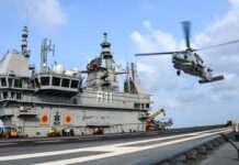 Lockheed Martin to Deliver All MH-60R Seahawks to Indian Navy by 2026 An Indian Navy MH60R Seahawk landing on INS Vikrant aircraft carrier