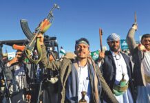 Houthi Strategy Against the US and Israel Armed Yemenis chant slogans during a march in solidarity with the people of Gaza on Nov 24, 2023, in the Houthi-controlled capital Sanaa.