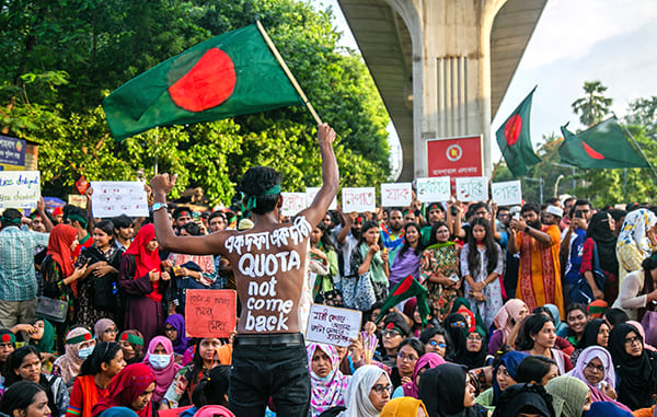 The quota reform movement in Bangladesh was organized to demand a reduction in government job quotas and shift toward merit-based recruitment. Waves of protests in 2024 led to the fall of the Hasina government.